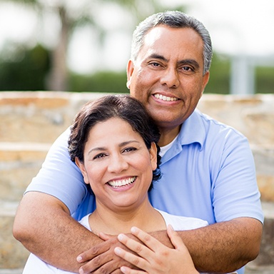 Man and woman smiling together