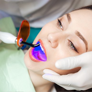 Woman recieving dental sealants