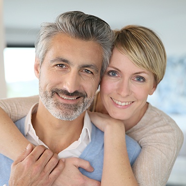 Smiling man and woman