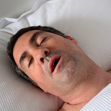 Sleeping man with mouth open