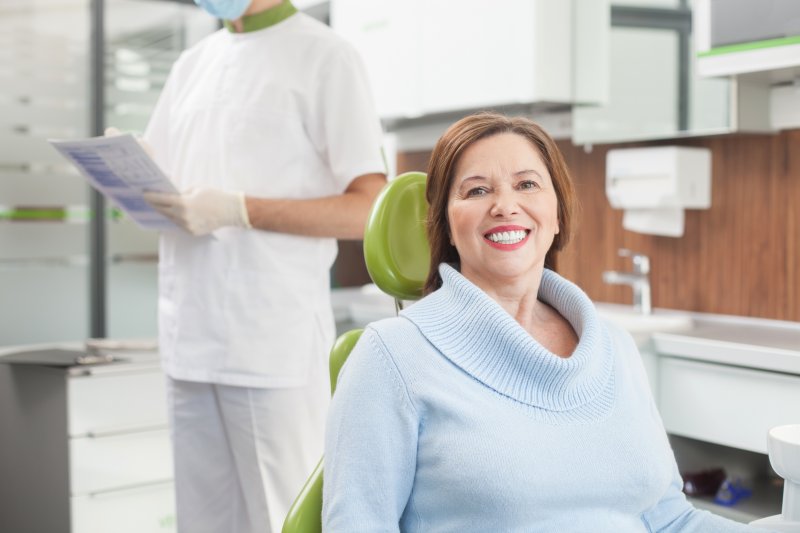 a woman in a dentist chair